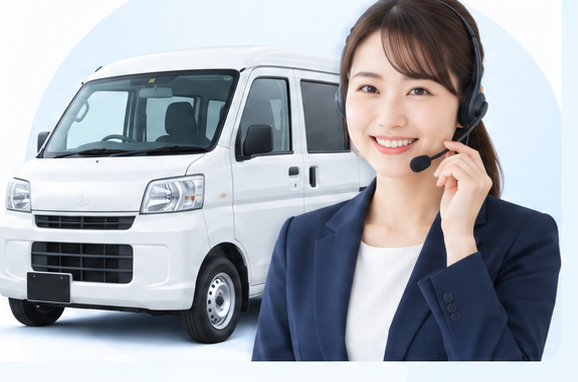 ヘッドセットをつけた相談スタッフと白い軽バン